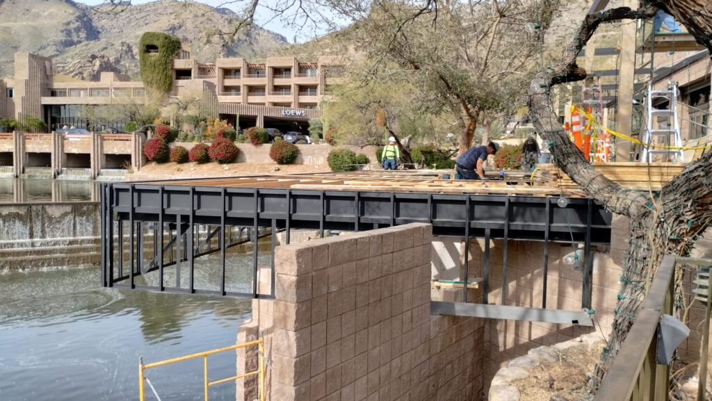 Steel pedestrian bridge framing at Loews Ventana Canyon, Tucson AZ